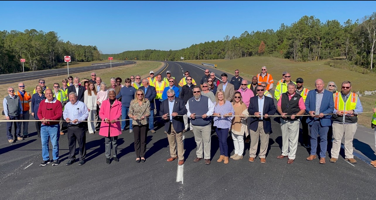 Officials cut the ribbon to open SR-158 on October 17, 2023
