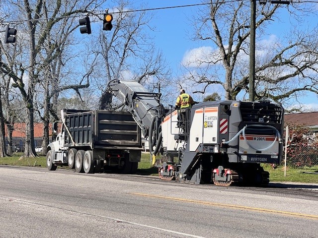Crews milling asphalt in Mobile, AL
