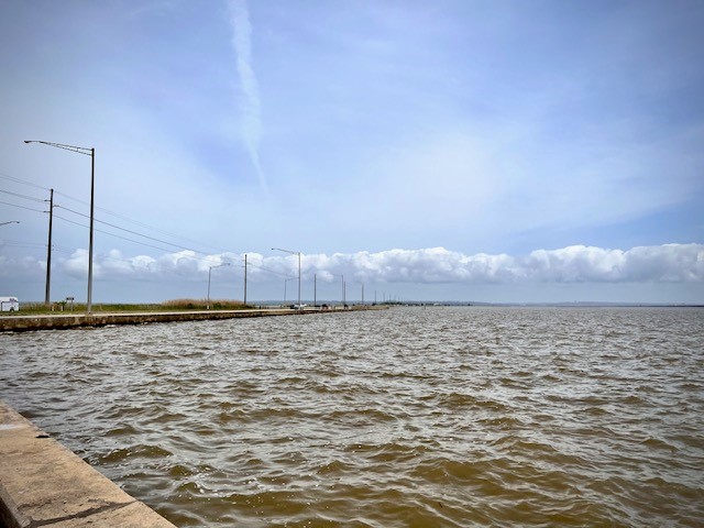 Mobile Bay waters lapping near the US 90 Causeway in Mobile Alabama