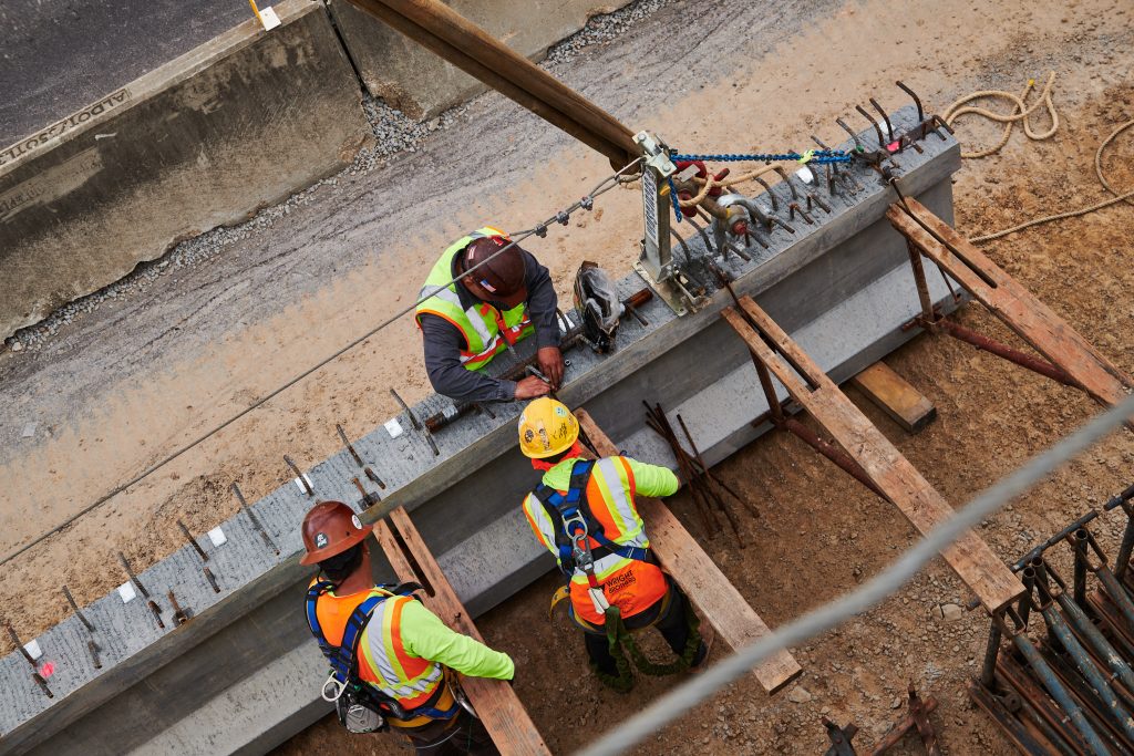 Workers begin welding on the SR-5 bridge in Jasper