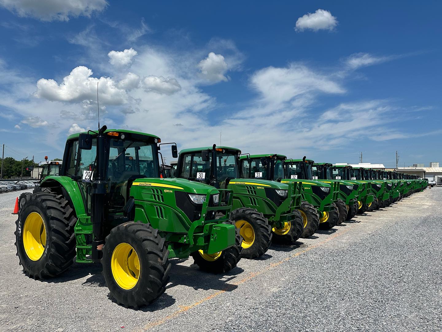 A line of green tractors
