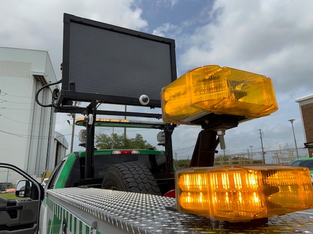 Portable message board and lights on the back of an ASAP truck