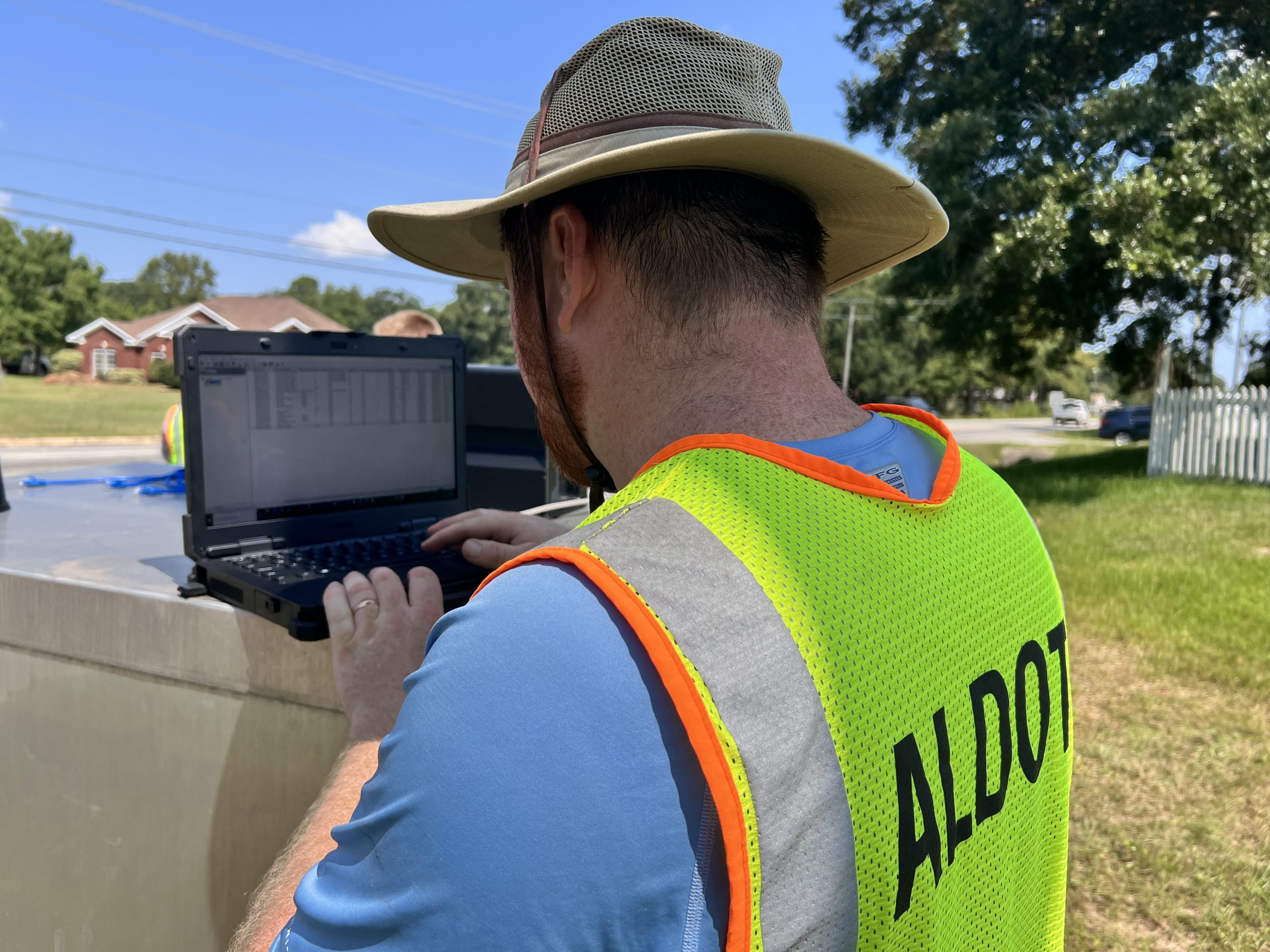 Signal Technician updates traffic signal timing