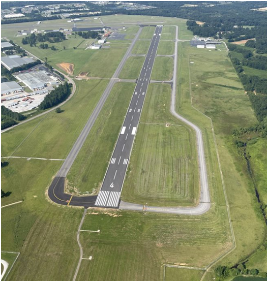 Aerial photo of an airport runway.