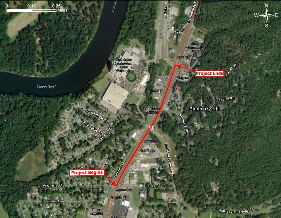 A terrain map with a red line highlighting the route of the proposed project. A red arrow points to the bottom of the red line and states "project begins" at Charles Avenue. A red arrow points to the end of the line up top and states "project ends" at South Main Street.
