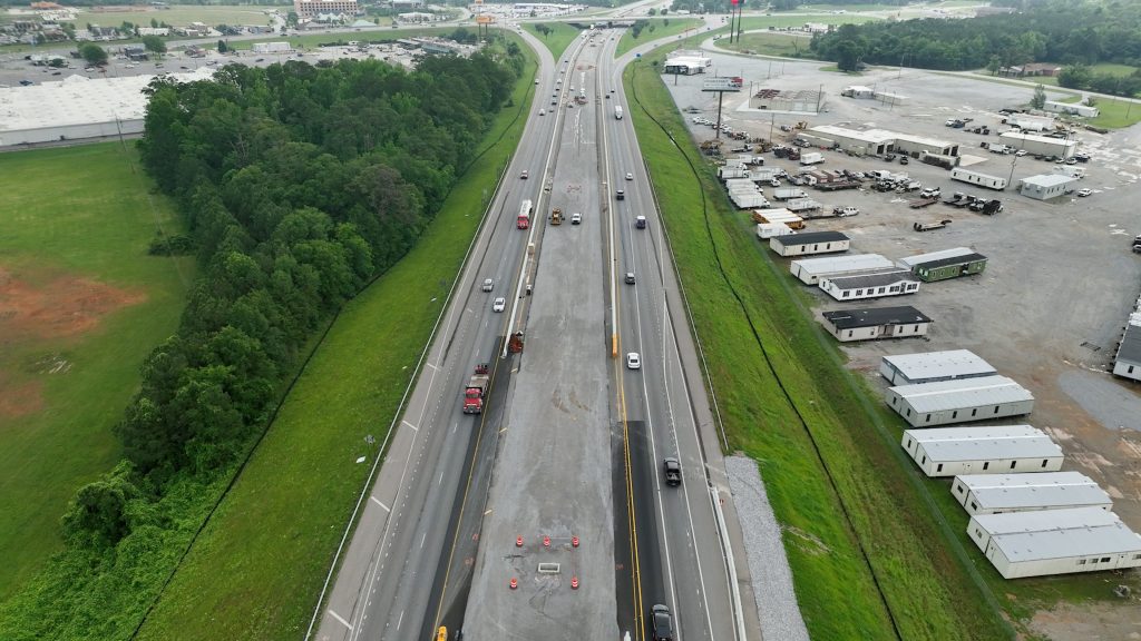 Picture of I-65 in Calera, Alabama showing the grading operation taking place in the median.