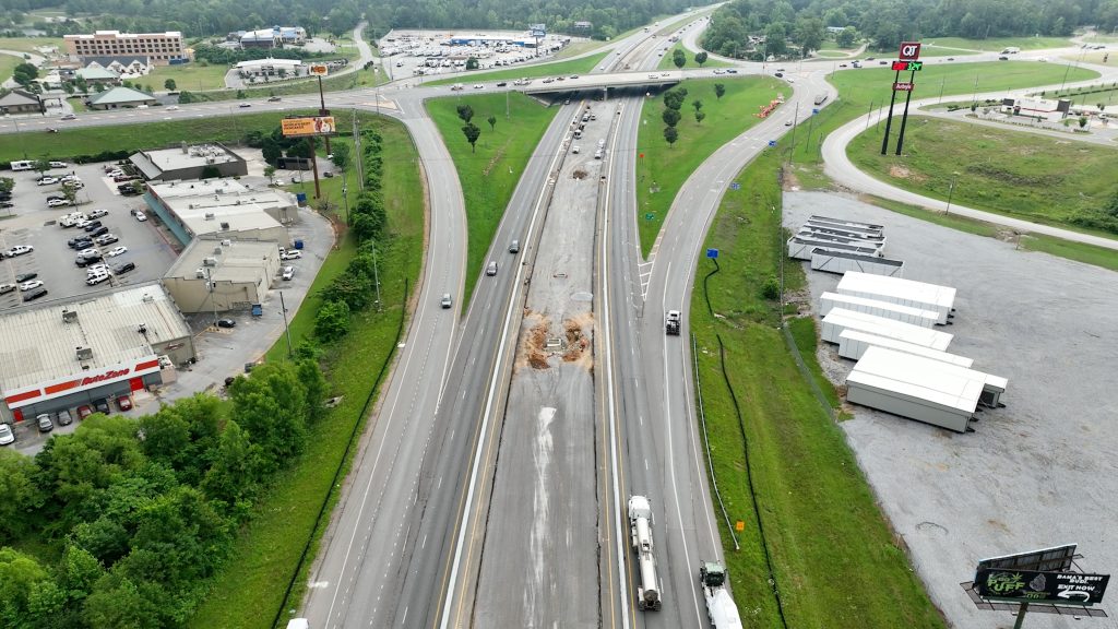 Picture of I-65 in Calera, Alabama showing the grading operation taking place in the median.