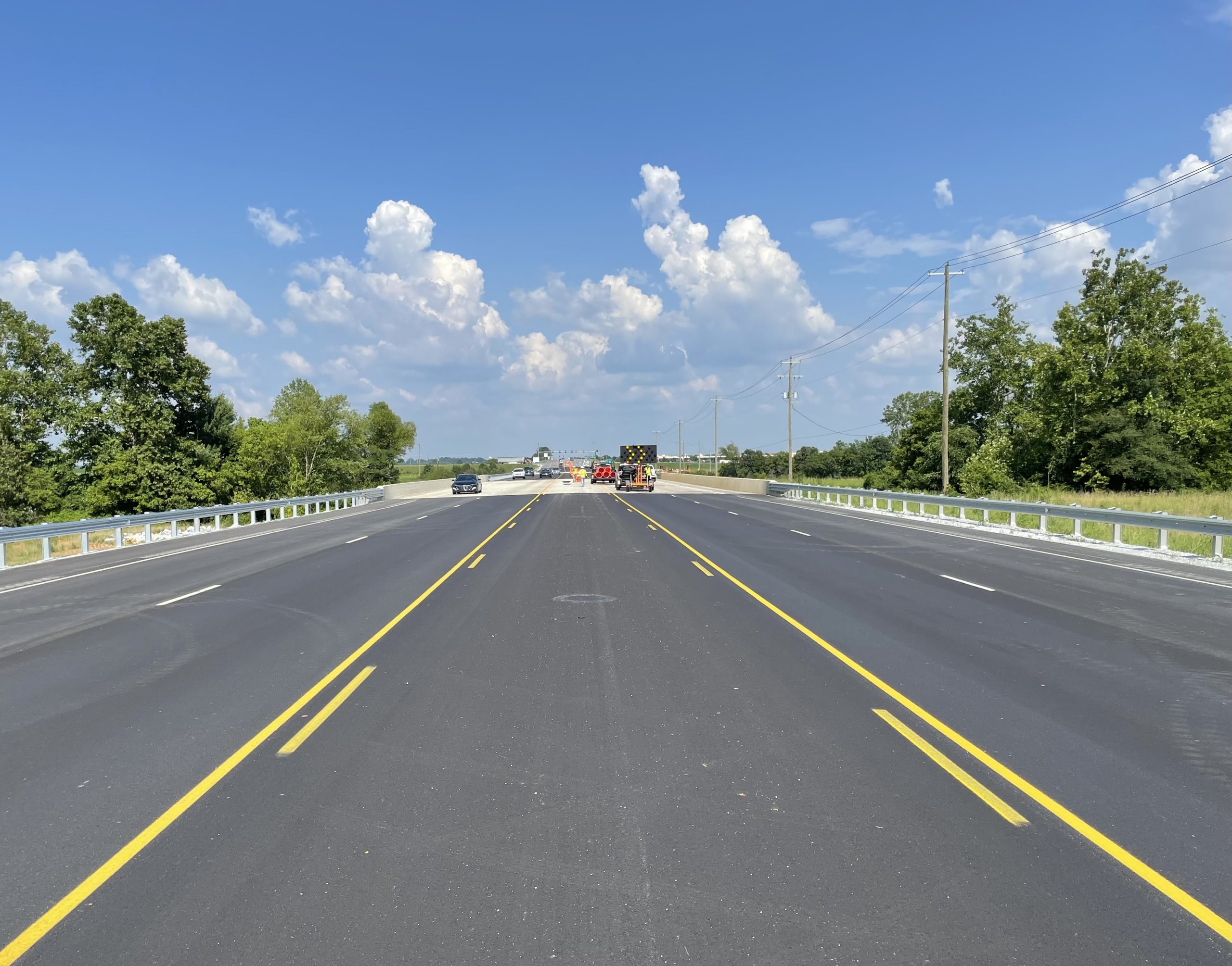 Photo of SR-304 showing where workers remove drums from the center lane .