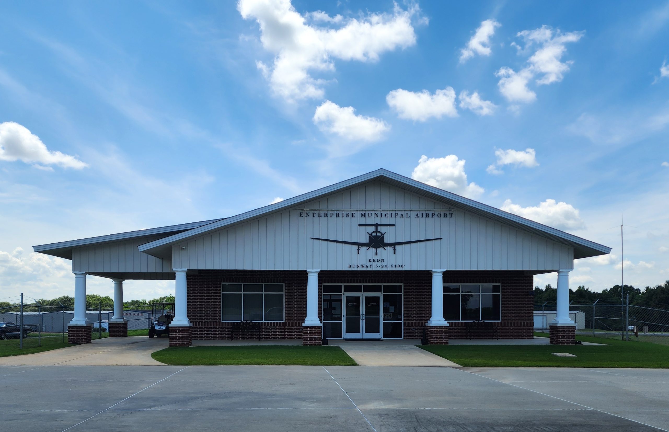Photo of the outside of the Enterprise Municipal Airport terminal.