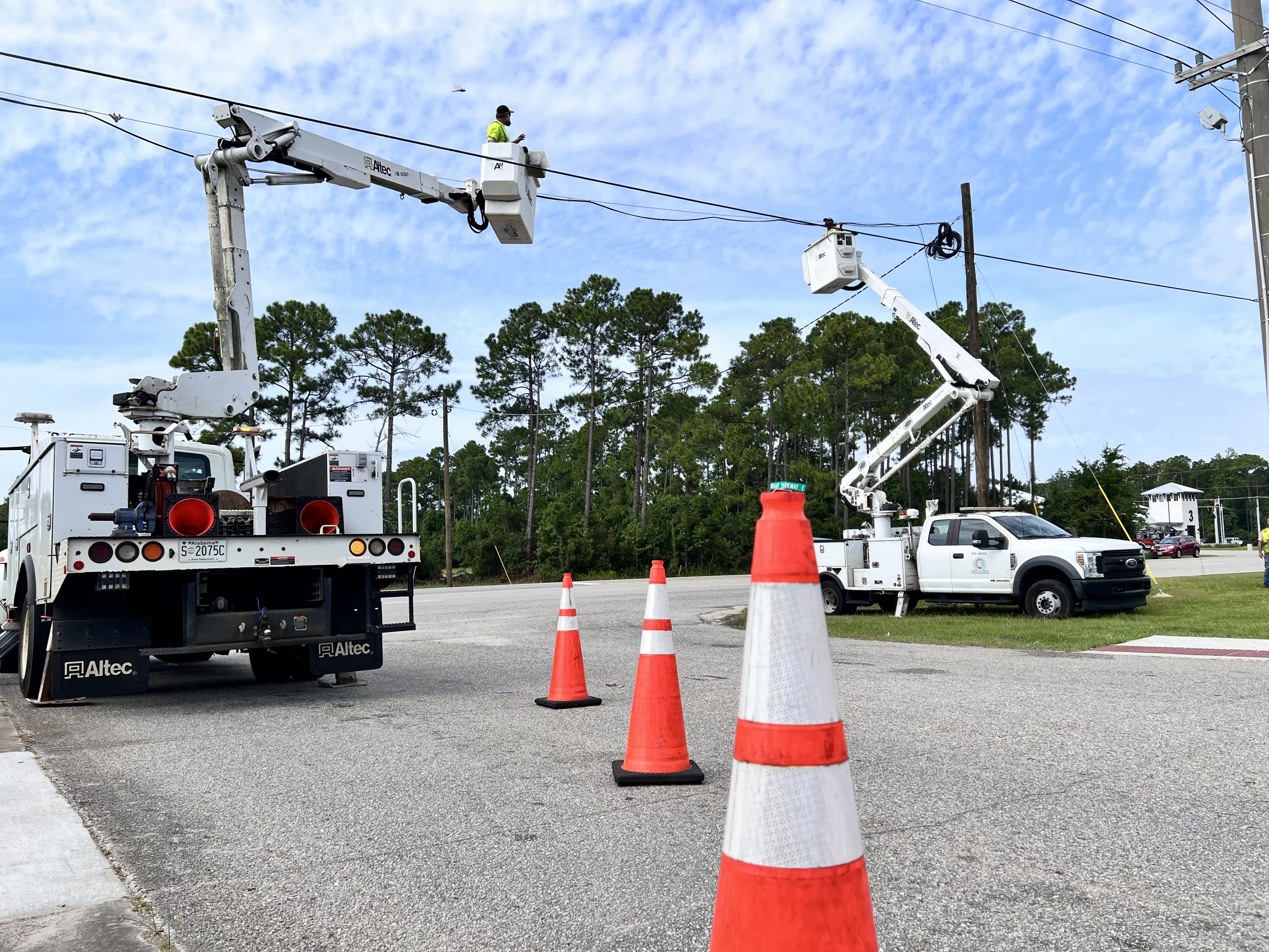 ALDOT signal technicians working on new traffic signal installation.
