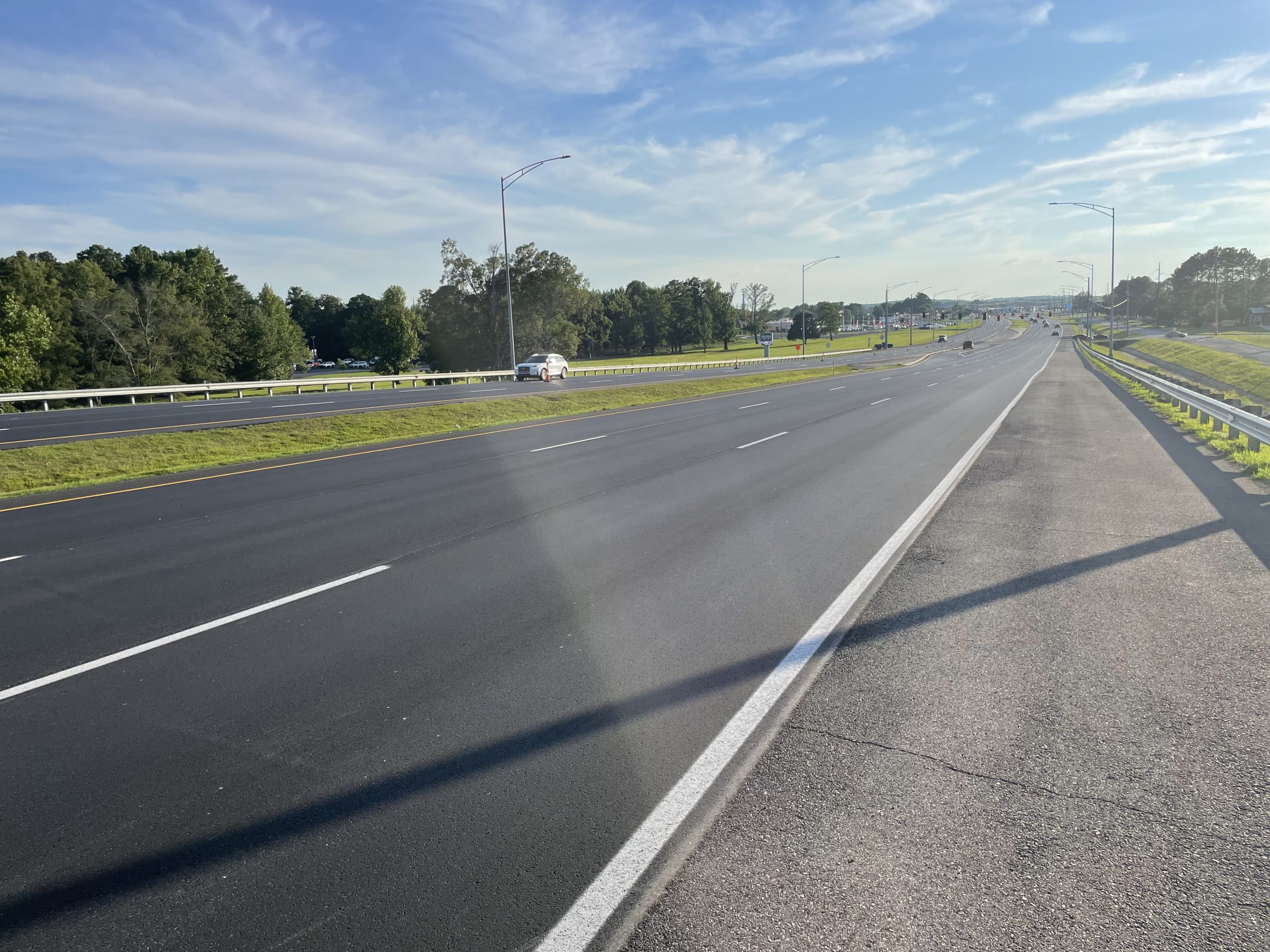 Fresh asphalt pavement on a six-lane highway