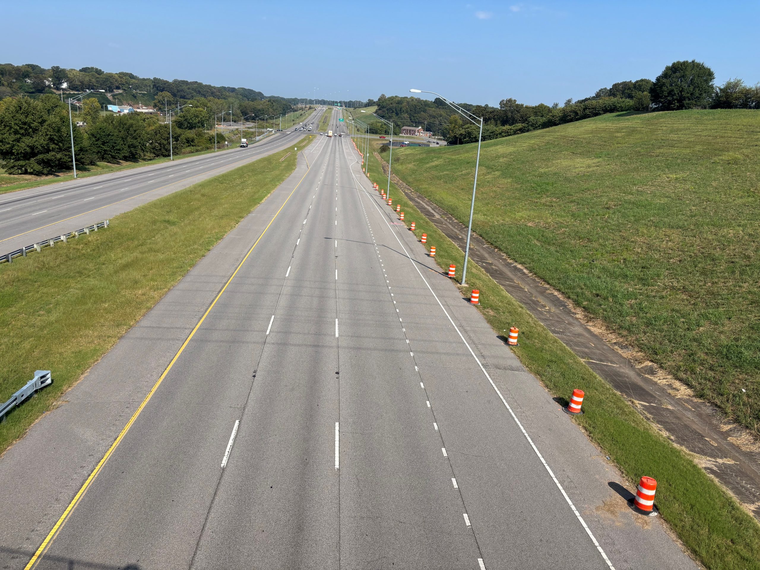 Drums line the shoulder of SR-157/Helton Drive northbound in Florence approaching Huntsville Road.