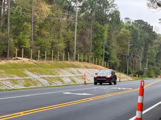 A recently widened and paved road with new striping on State Route 225 in Spanish Fort, Alabama.