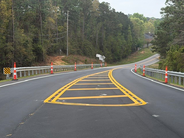 A recently widened and paved road with new striping on State Route 225 in Spanish Fort, Alabama.