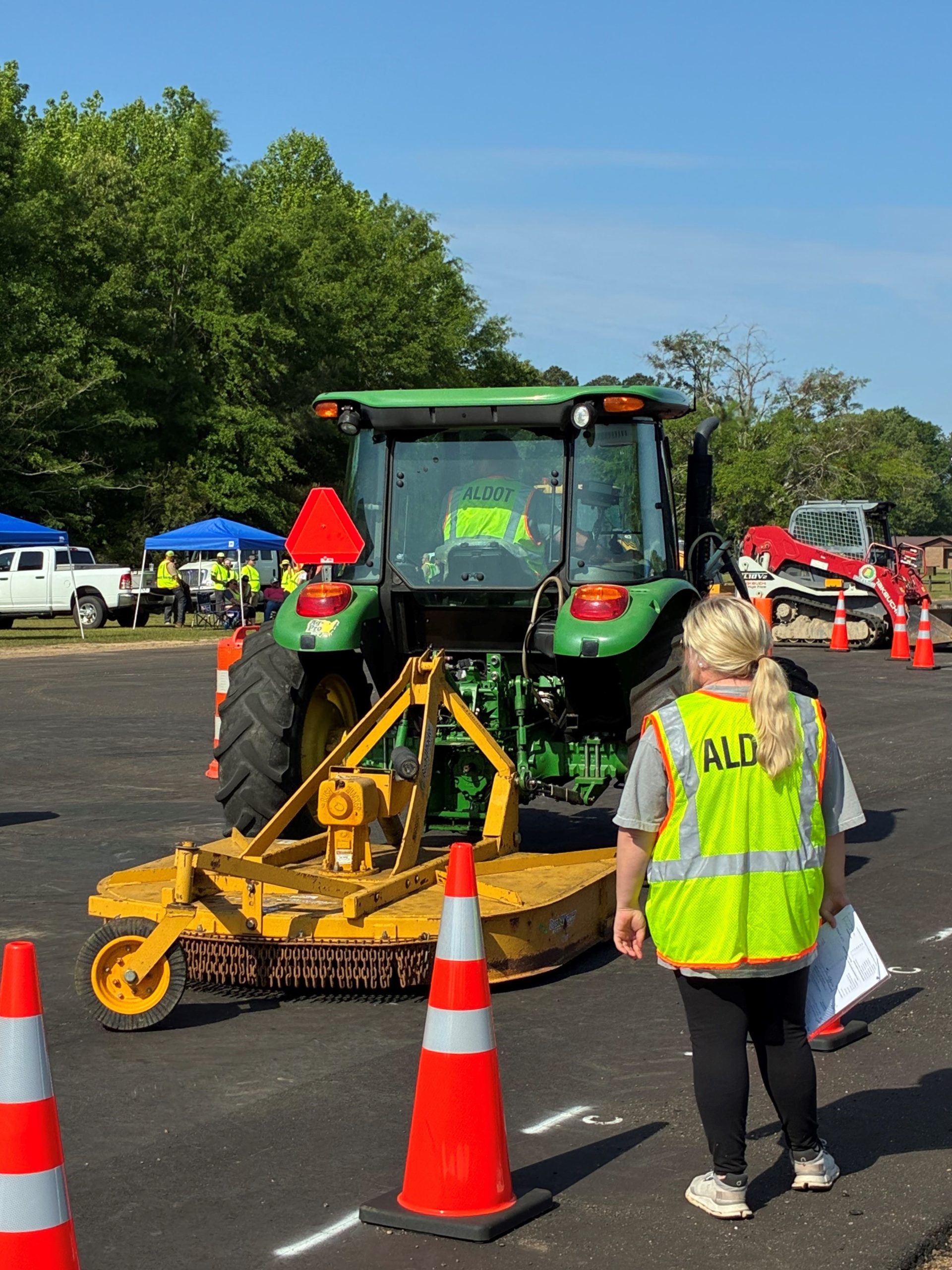 ALDOT Equipment ROADeo in Fayette. A tractor goes through cones.
