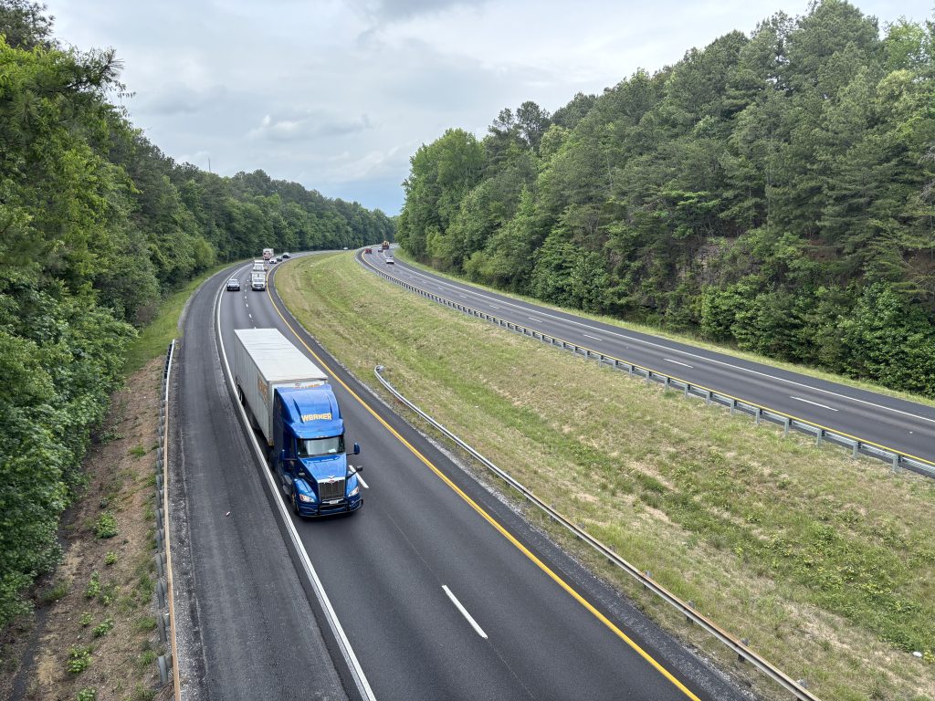 Traffic travels on a recently-resurfaced interstate highway