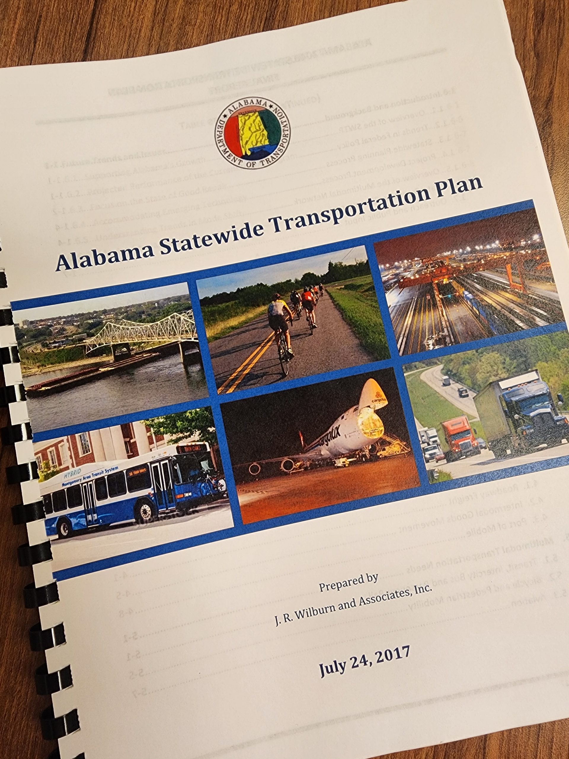 Cover of the Alabama Statewide Transportation Plan, published July 24, 2017, featuring the ALDOT logo and images representing highways, bridges, transit, bicycling, aviation, freight rail and trucking.