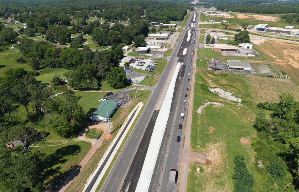 An Aerial view of US-72/Florence Boulevard shows new pavement in the turn lanes and future inside lanes.