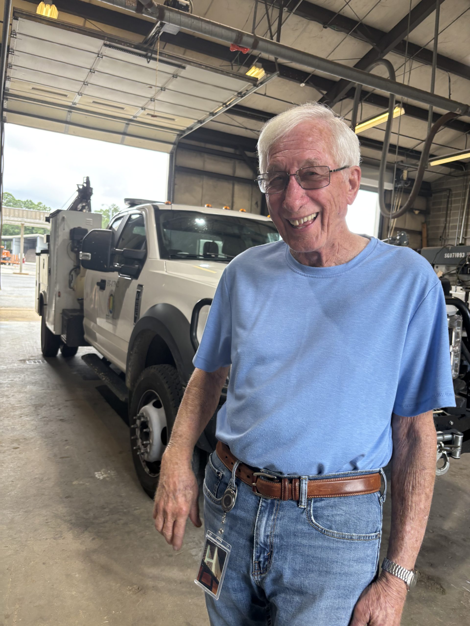 A photo of an older gentleman laughing