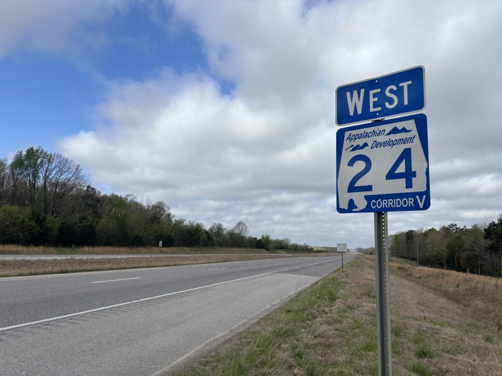 An Appalachian Development Highway System marks a divided four-lane highway as being SR-24.