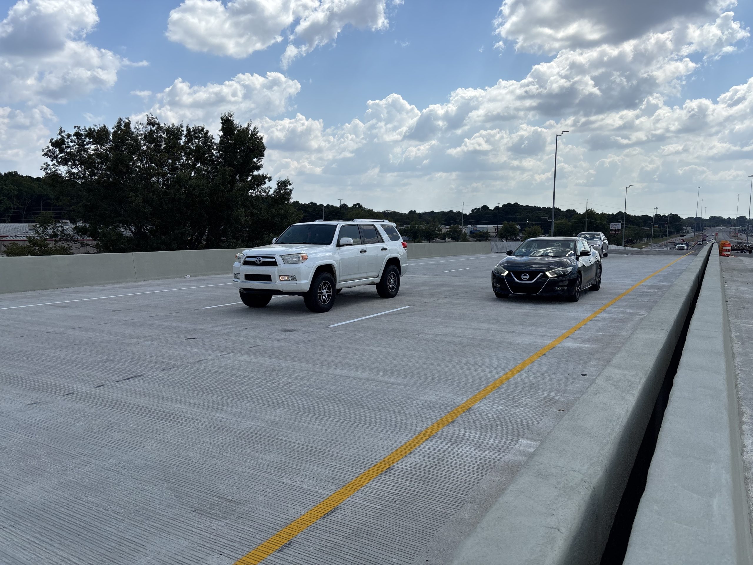 Traffic travels on an overpass.