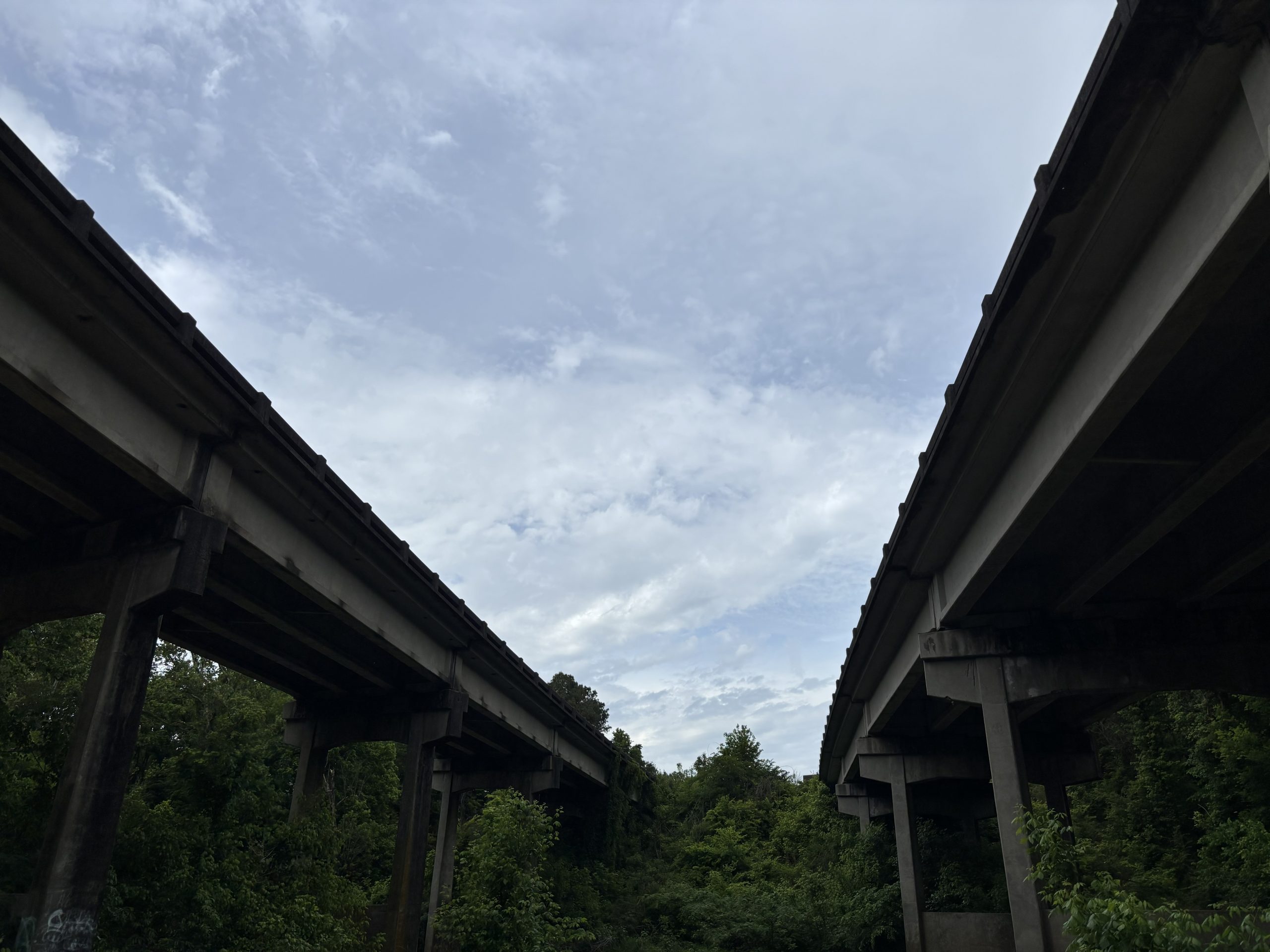Two bridges against the sky, viewed from below